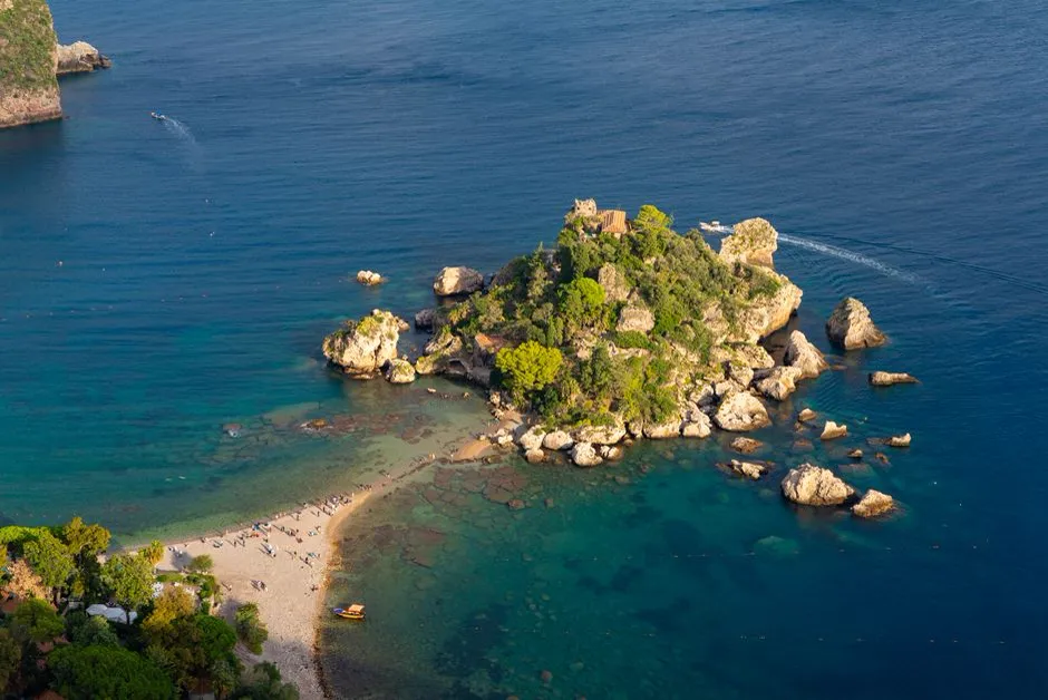 Aerial view of Isola Bella, the small island connected to Taormina, Sicily by a narrow sandbar