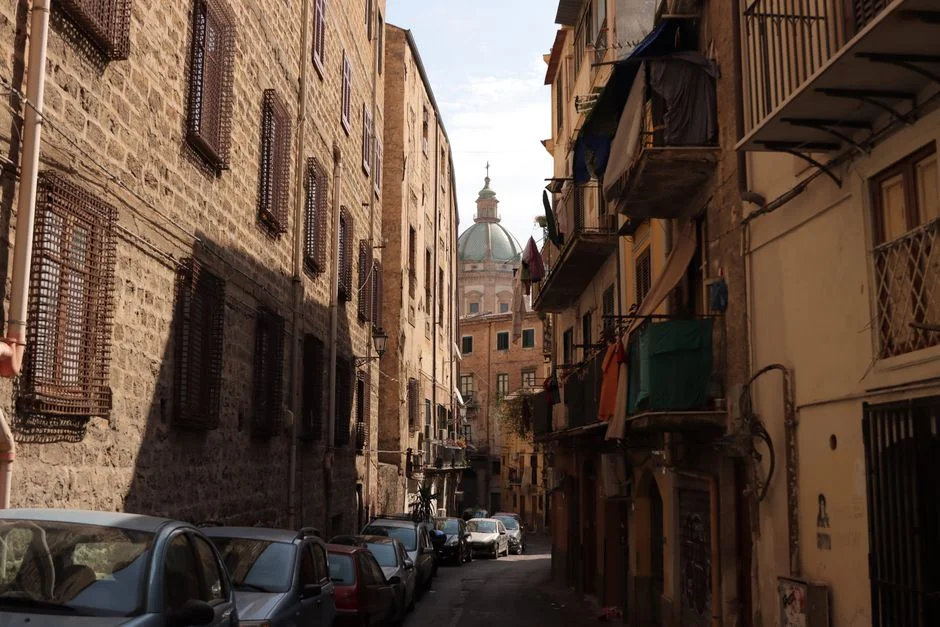 A picturesque street in Palermo, capturing the essence of Sicilian urban life.