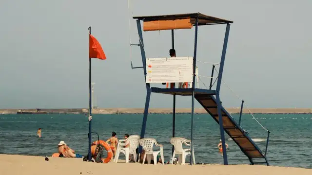 Lifeguard station on a sunny beach in Catania, Sicily, perfect for summer recreation.