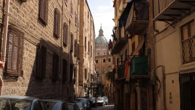 A picturesque street in Palermo, capturing the essence of Sicilian urban life.